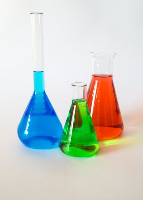 Colored liquids in glass beakers